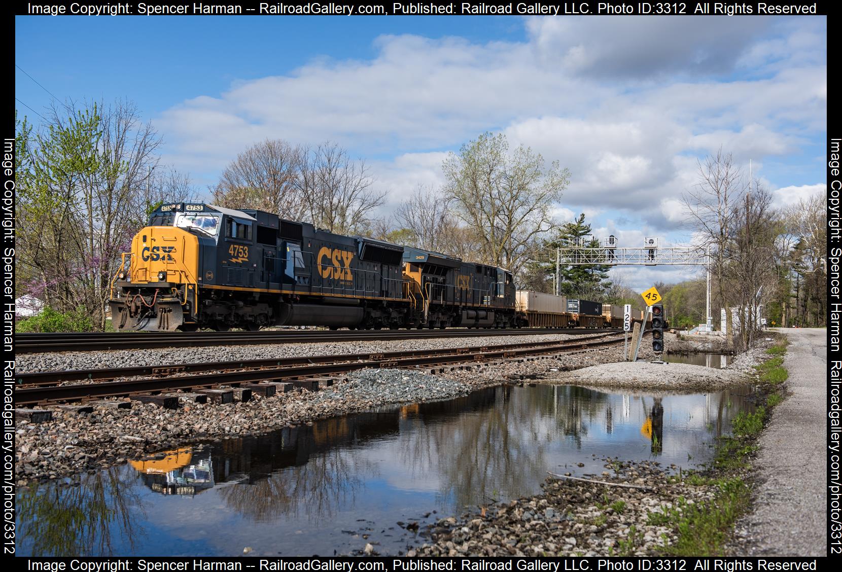CSXT 4753 is a class EMD SD70MAC and  is pictured in Auburn, Indiana, USA.  This was taken along the Garrett Subdivision on the CSX Transportation. Photo Copyright: Spencer Harman uploaded to Railroad Gallery on 04/21/2024. This photograph of CSXT 4753 was taken on Sunday, April 21, 2024. All Rights Reserved. 